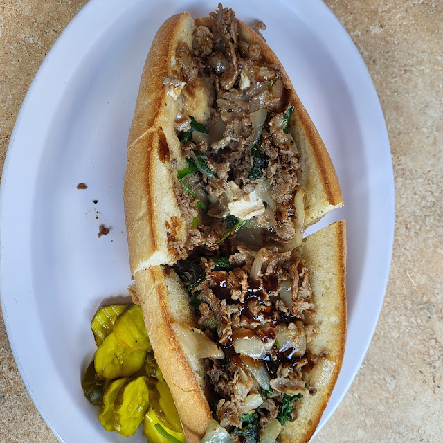 Triple Cheese Cheesesteak and Onion Rings