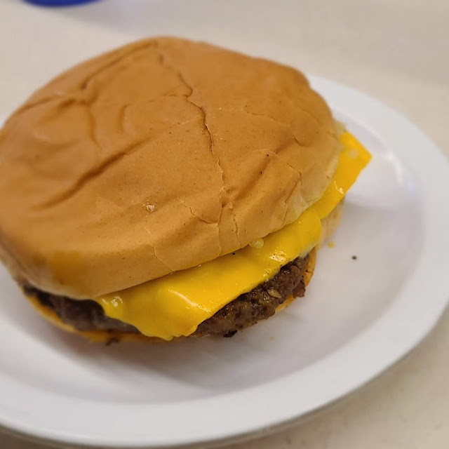 Cheeseburger with Mustard and Pickles