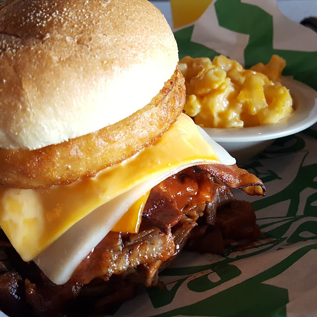 Lebron Sliced Beef Piled High & Smothered w Cheese and Topped with Bacon and Crisp Onion Rings