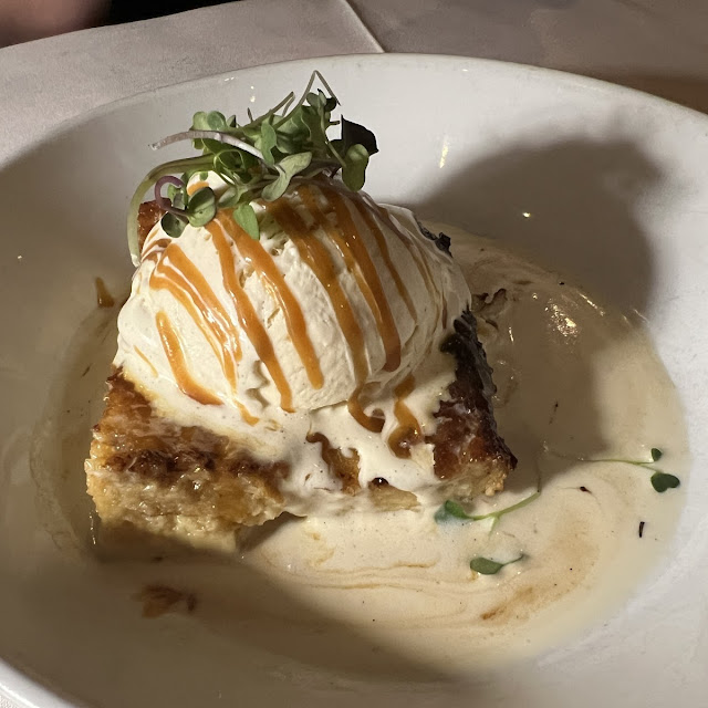 White Chocolate Tres Leches Croissant Bread Pudding with Vanilla Bean Ice Cream