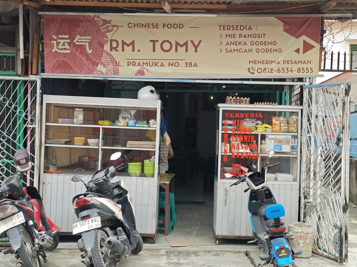 RM. TOMY