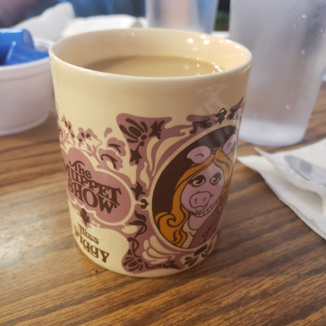 Coffee in One of the Eclectic Cups They Have