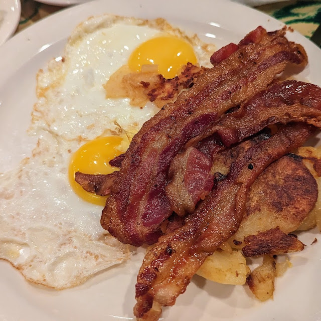 Two Eggs Any Style with Canadian Bacon Pastrami or Corned Beef Hash