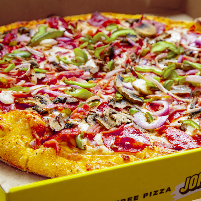 Our Howie Special Pizza Features Pepperoni Ham Mushroom Green Pepper Onion & Mozzarella