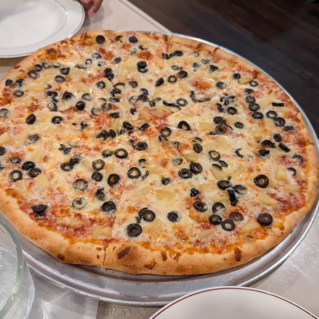 Black Olives and Pineapple Pizza