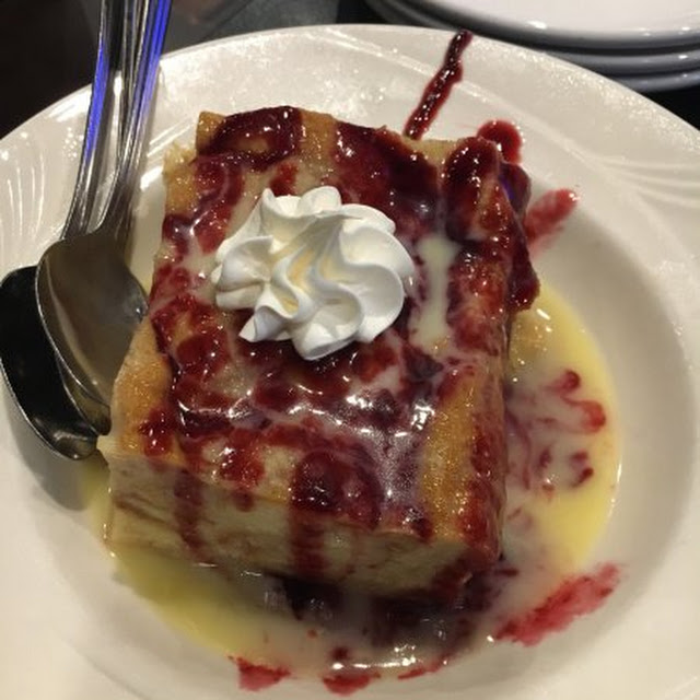 Whiskey Bread Pudding with Raspberry Sauce