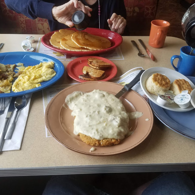 Chicken Fried Steak with Gravy with a Side of Biscuits and Gravy